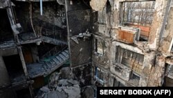 Жилой дом в Харькове после обстрела российской армией