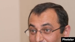 Armenia -- Parliament deputy Artsvik Minasian holds a news conference on August 20, 2009.