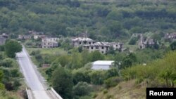Надежда, что муж и остальные задержанные еще живы, жила два с половиной года, пока останки 12 человек со следами пыток не были найдены возле села