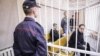 Юры Паўлавец, Дзьмітры Алімкін і Сяргей Шыптэнка на лаве падсудных