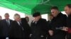 Armenia -- Moscow Mayor Yury Luzhkov (C) and Armenian officials discuss a major redevelopment project in Yerevan, 29Jan2010