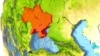 Ukraine – Ukraine in red on a globe with reflective ocean waters. 3D illustration with highly detailed realistic planet surface. Elements of this image furnished by NASA.
