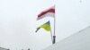 Belarus - Ukrainian and Belarusian flags on the roof of Kastus Zhukouski house in Homel, 9Dec2013