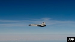 Fotografie publicată de forțele aeriene suedeze: un avion rus MiG-31 zboară deasupra Mării Baltice după ce a încălcat spațiul aerian al Estoniei. 19 septembrie 2025