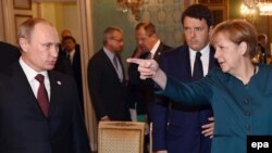 Numai Merkel il poate pune la punct pe Putin.