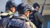 Descinderile sunt făcute de INI, în comun cu procurorii PCCOCS, mascații din Brigada de Poliție cu Destinație Specială „Fulger” și angajații Serviciului de Informații și Securitate. Imagine generică.
