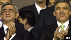 Turkey -- President Abdullah Gul (R) with his Armenian counterpart Serzh Sarkisian at Turkey vs Armenia FIFA 2010 World Cup group match in Bursa, 14Oct2009