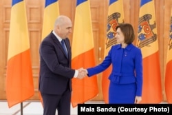 Ilie Bolojan și Maia Sandu, președinta Republici Moldova.