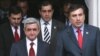 Armenia -- Presidents Serzh Sarkisian (L) of Armenia and Mikheil Saakashvili of Georgia meet in Yerevan on June 24, 2009.