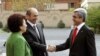 Armenia - Armenian President-elect Serzh Sarkisian (L) shakes hands with former Armenian President Robert Kocharyan (C) and his wife Bella (L) during an inauguration ceremony in Yerevan, 09Apr2008